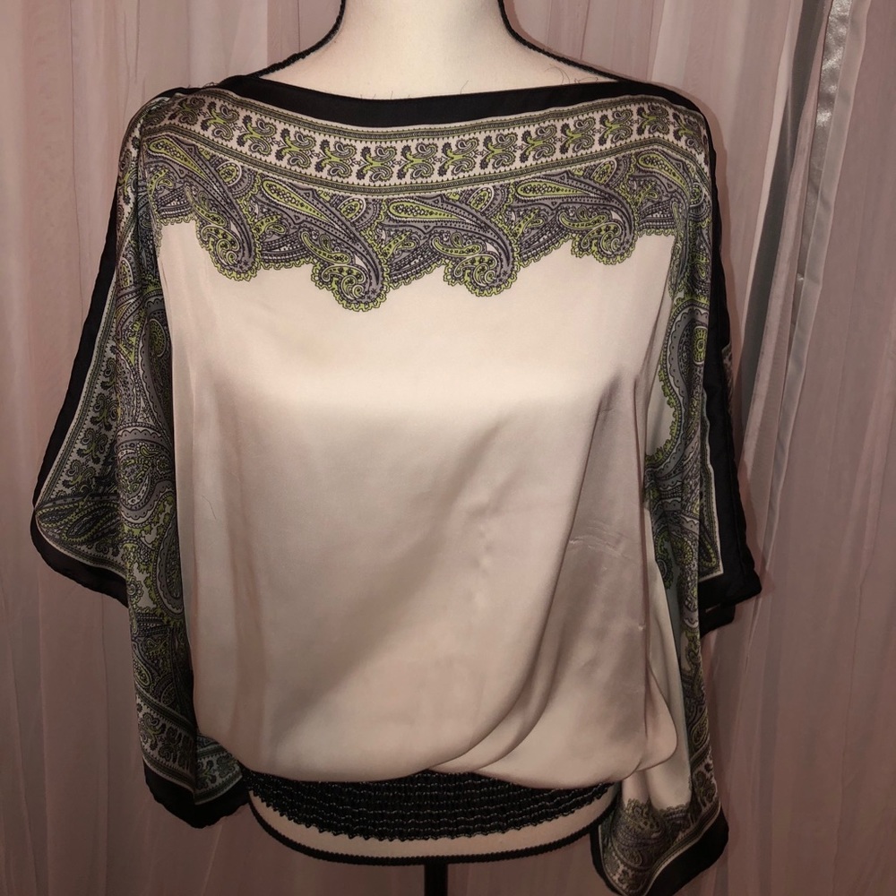 White and black paisley print. Bat wing sleeves